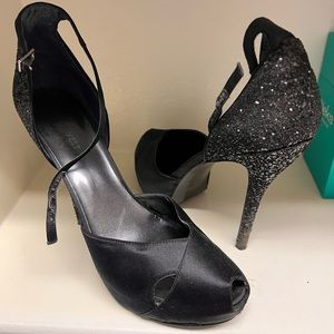Black satin and glitter strappy heels.